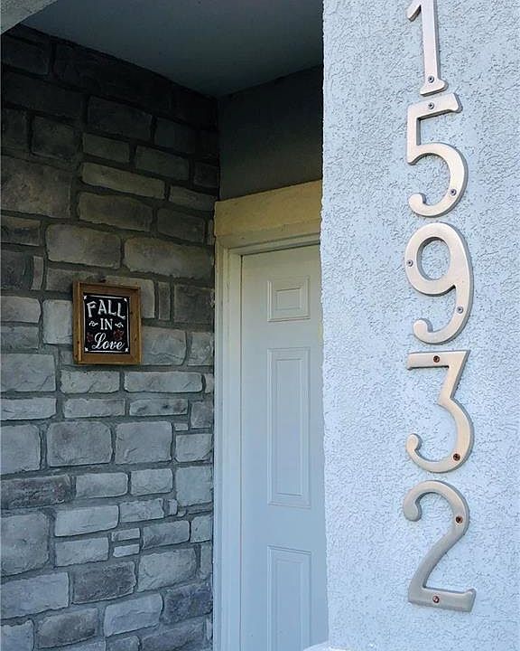 Enter and attached garage access to the left. Go up steps to one one level living.