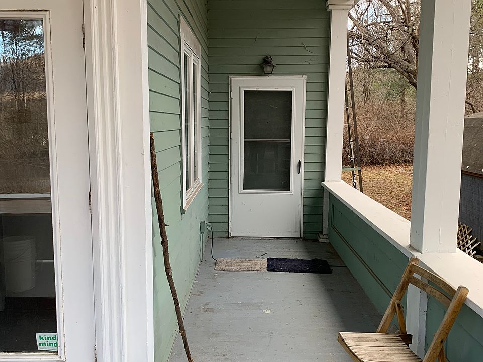 The porch showing north entry door to apartment. This section of the porch is for tenant's use.