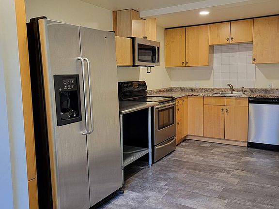 Stainless steel appliances in kitchen