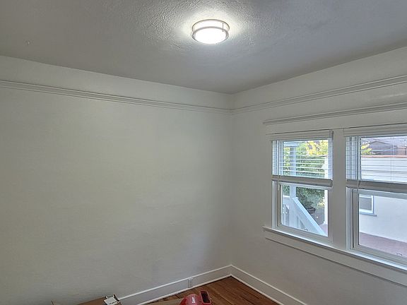 All new blinds and light fixtures, great natural light throughout.