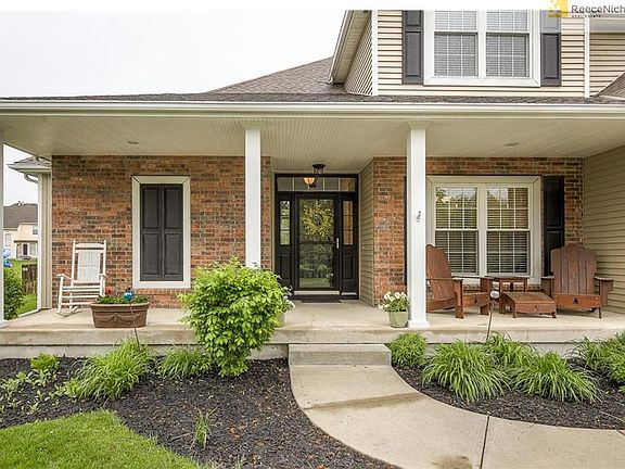 Large and inviting front porch.