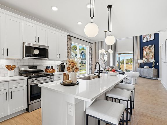 These photos are representative of this floor plan, but all options may not be available in every co