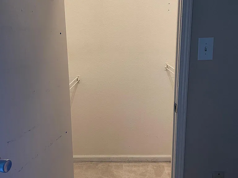 walk-in closet in second bedroom
