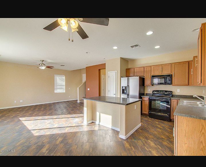 Kitchen open to dining and living room
