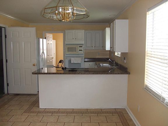 5th image of 8525 Lawnpark Dr