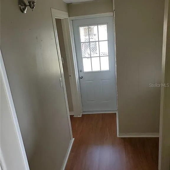 Hallway to utility room and Bedroom 3