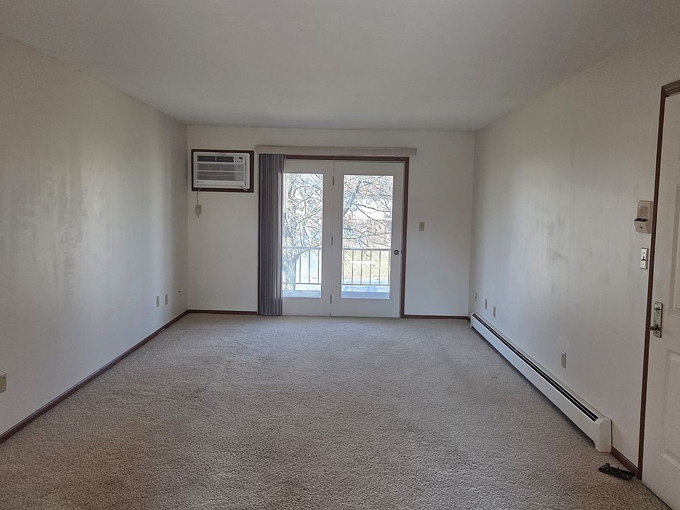 Huge living room with AC unit.