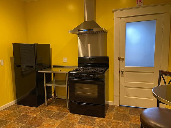 Kitchen with appliances included.