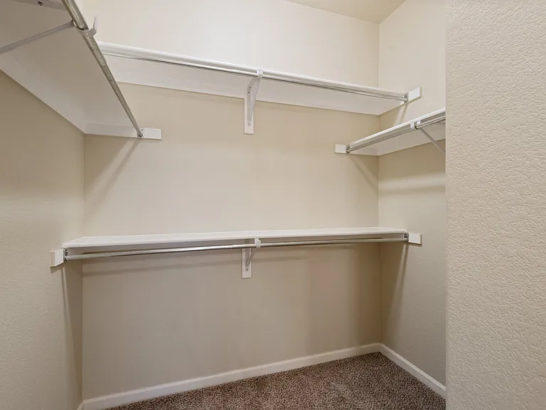 Walk in closet in master bathroom