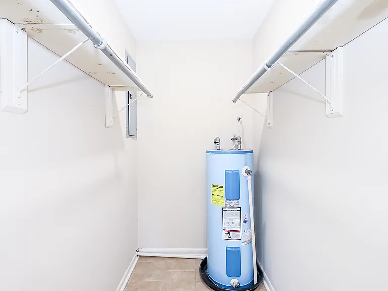 Walk-in closet with lots of storage space.