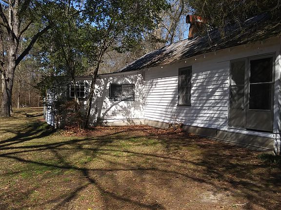 Left side of house. The washroom.
