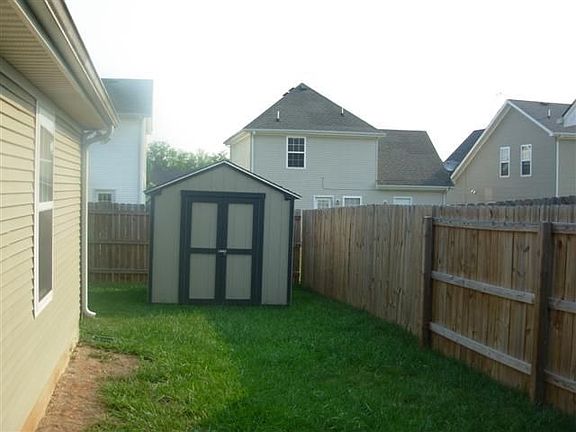Side yard with storage shed