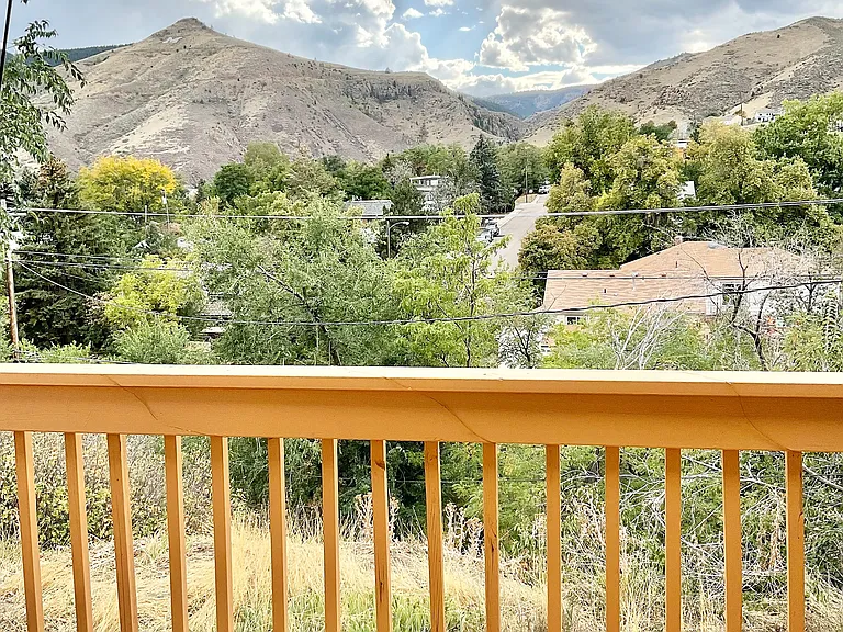 Relax and enjoy the serene mountain view from your private balcony.