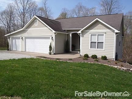 Front Exterior
						:
						Pic doesn't reflect new roof. NEW in 2011- paint/gutters, concrete/landscape