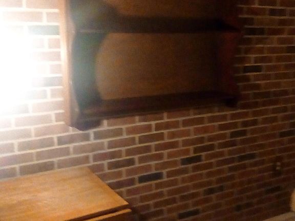 Living room showing built in shelf