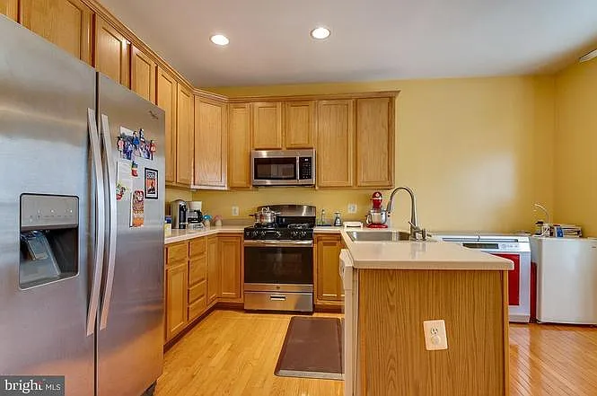 Kitchen has been recently renovated with granite countertops and new appliances.