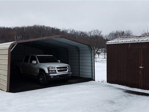 Carport for two cars and large shed