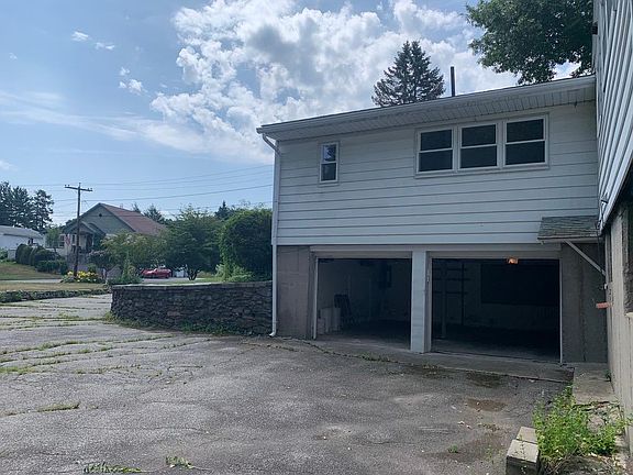 Large second private parking area with access to the attached two-car garage.