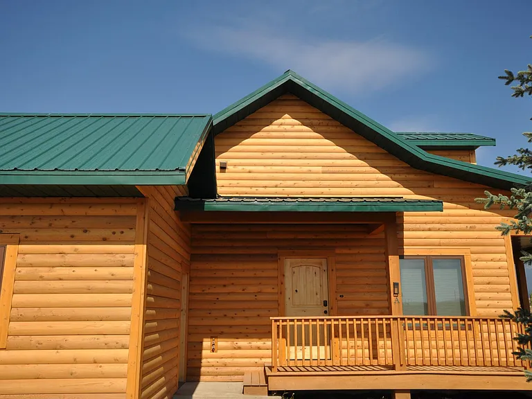 Side view of cabin with garage attached