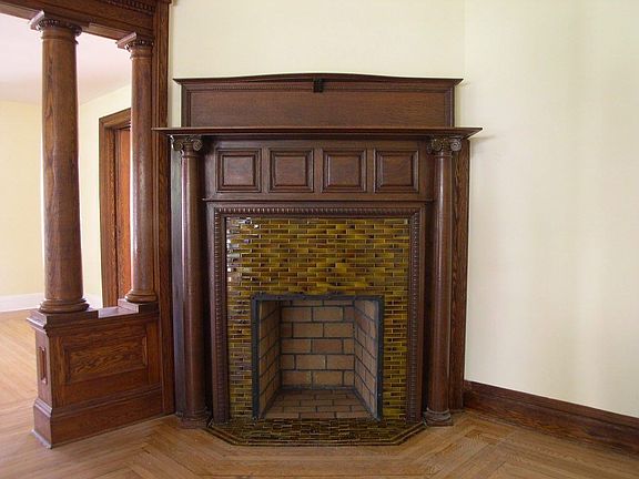 Original Wood Burning Fireplace in Den