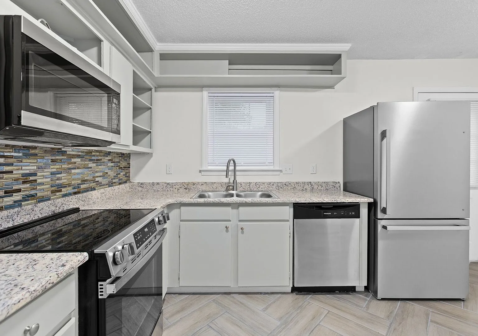 Updated Two-Bedroom Condo with New Kitchen Appliances and Private Patio — Photo 1