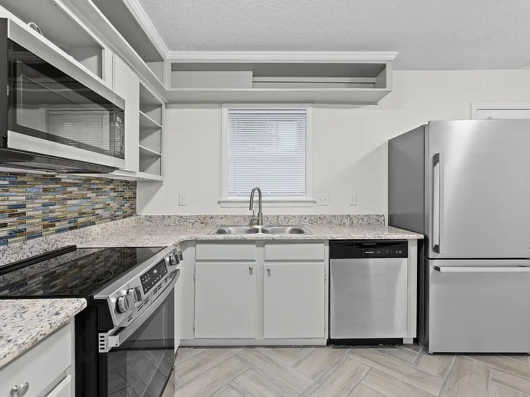 1303 W Meadowview Rd #F — Photo 1