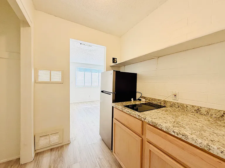 Studios, 1 Bedrooms and 2 Bedrooms! Charming Community with Off Street Parking — Photo 6