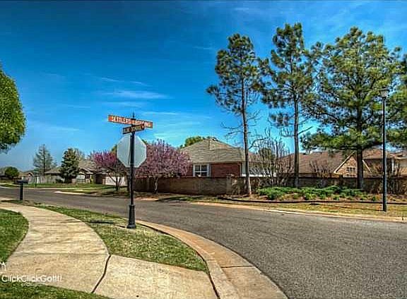 BRICK WALL FENCING - BEAUTIFUL COMMON AREA TREES!