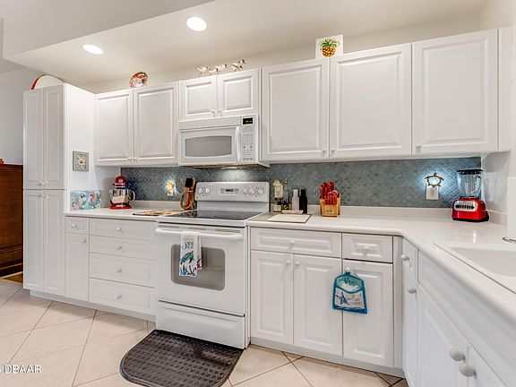 5th image of 250 Minorca Beach Way APT 203