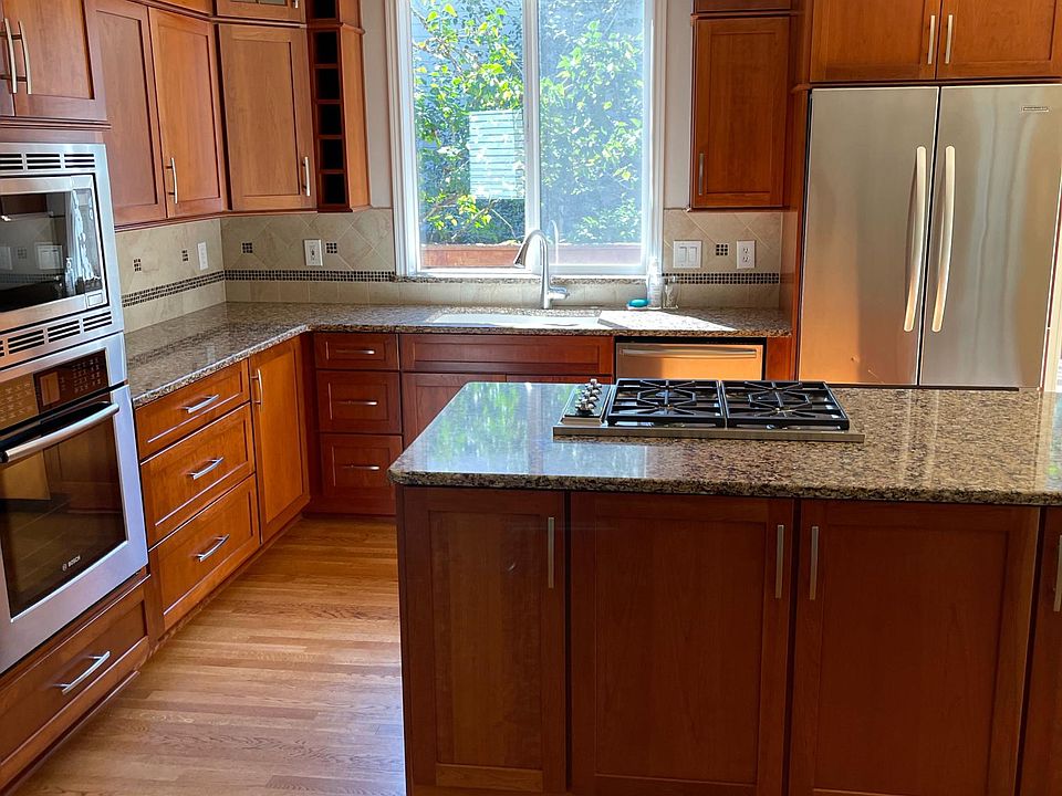 Kitchen with stainless appliances, soft close doors and large pull out drawers
