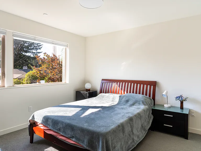 Spacious 1st floor bedroom with a private full bathroom.
