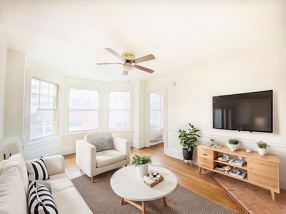 Living Room Virtually Staged (Please see next photo without staging)

Disclaimer: The image shown is virtually staged and provides a general idea of the space. Actual measurements and details may vary slightly from what is depicted.