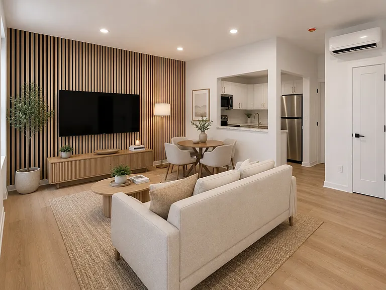 Virtually staged living and dining area showing one possible layout based on the floor plan dimensions. Apartment is delivered unfurnished.