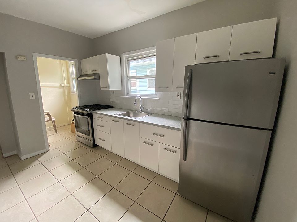 Here are the images showcasing the newly renovated kitchen, living room, balcony, and bathroom.