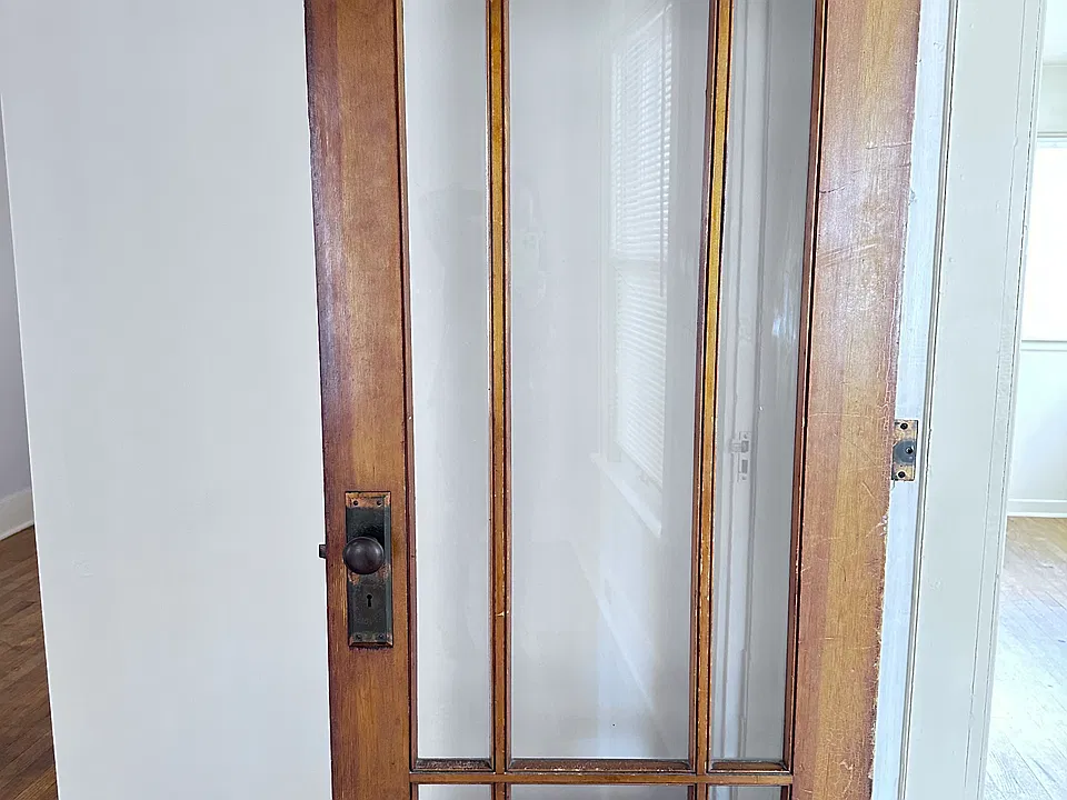 Classic Wood and Glass Porch Entry.