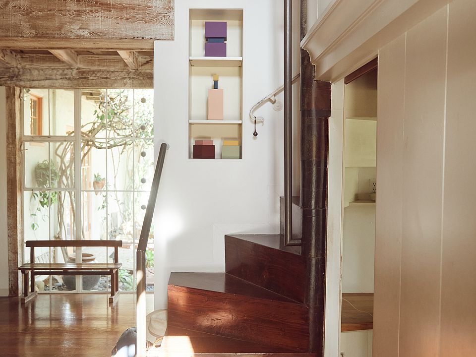 Staircase leading to bedroom loft/office.