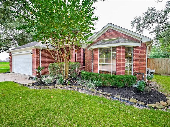 Mature trees and landscape adorns the property making you feel like you've made it home!