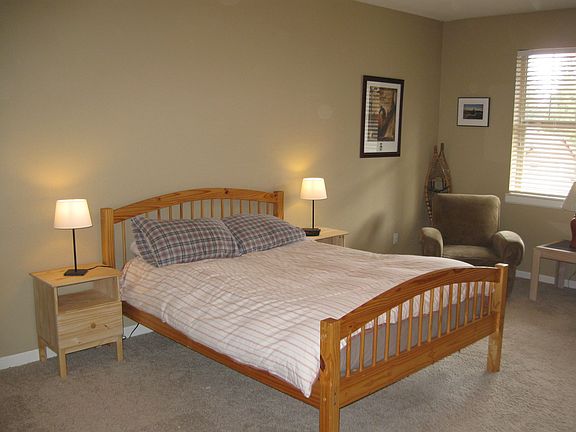 Large downstairs master bedroom with queen bed