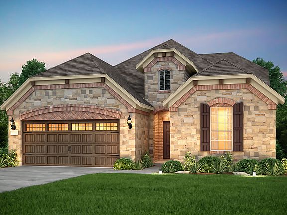 The Mooreville, a two-story home with 2-car garage, shown with Home Exterior F