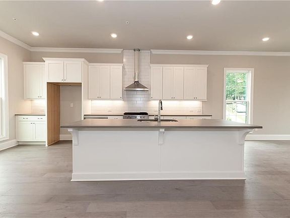 The Malone plan features a huge, entertaining island.