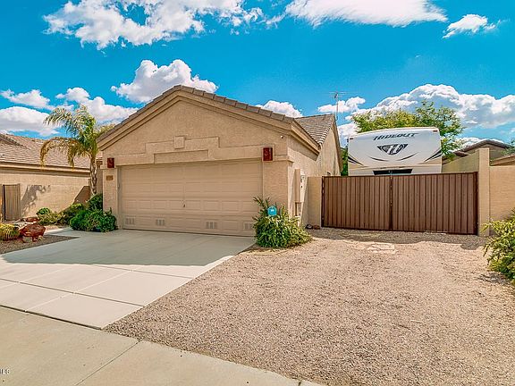 Front of Home with RV Gate