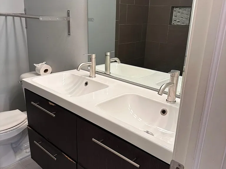 Primary Bathroom -- Dual Sink, Porcelain Countertop, Soft-Close Drawers