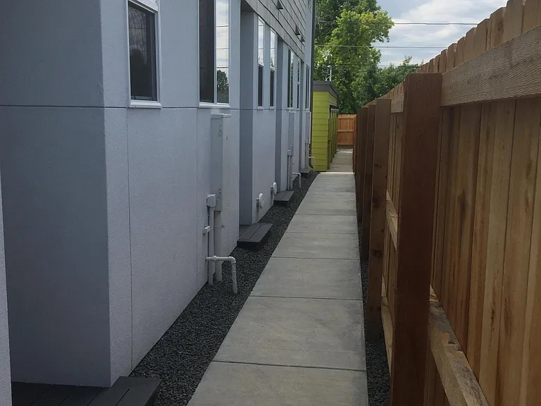 rear exterior w/ walkway to detached garage