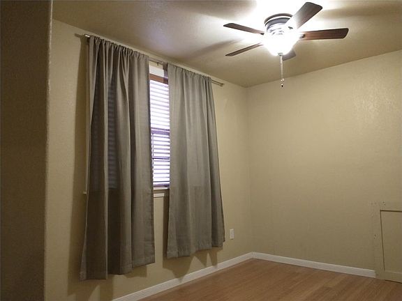 Master bedroom with walk in closet and views.
