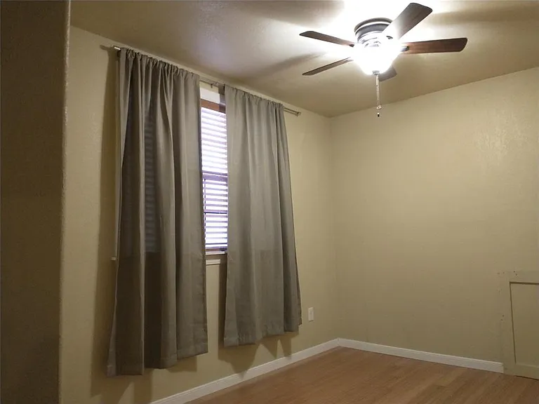 Master bedroom with walk in closet and views.
