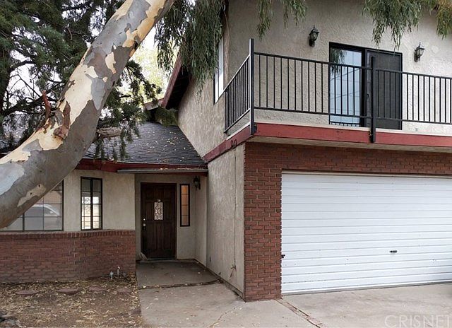 Facing Front Entrance of House