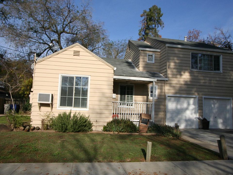 Front of Triplex - available unit on the left.