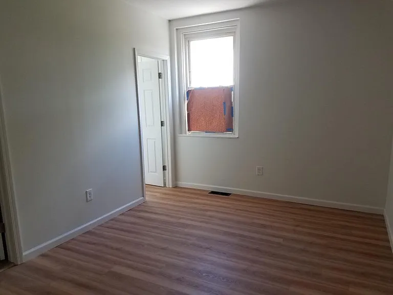 Bedroom with walk in closet