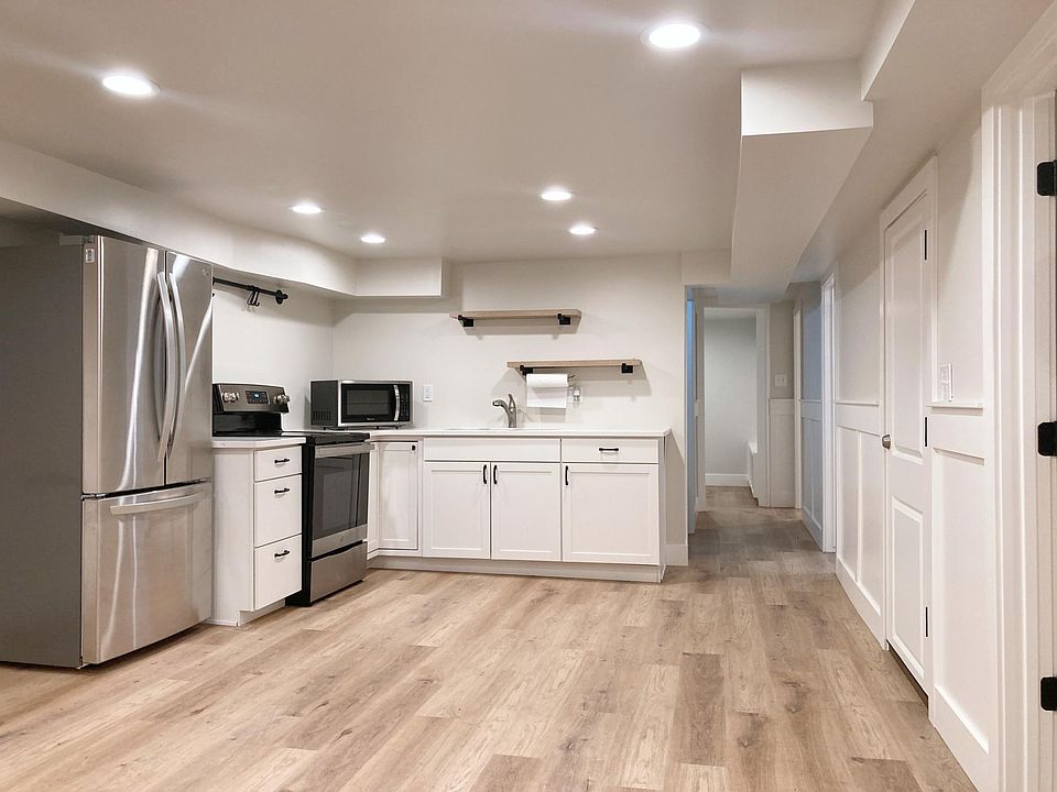 Kitchen. Open space concept. Bedrooms along the right side. Laundry room and bathroom behind sink wall.