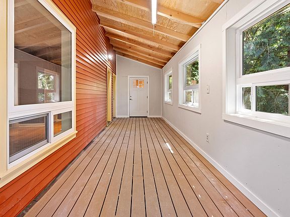 Enclosed, shared back porch